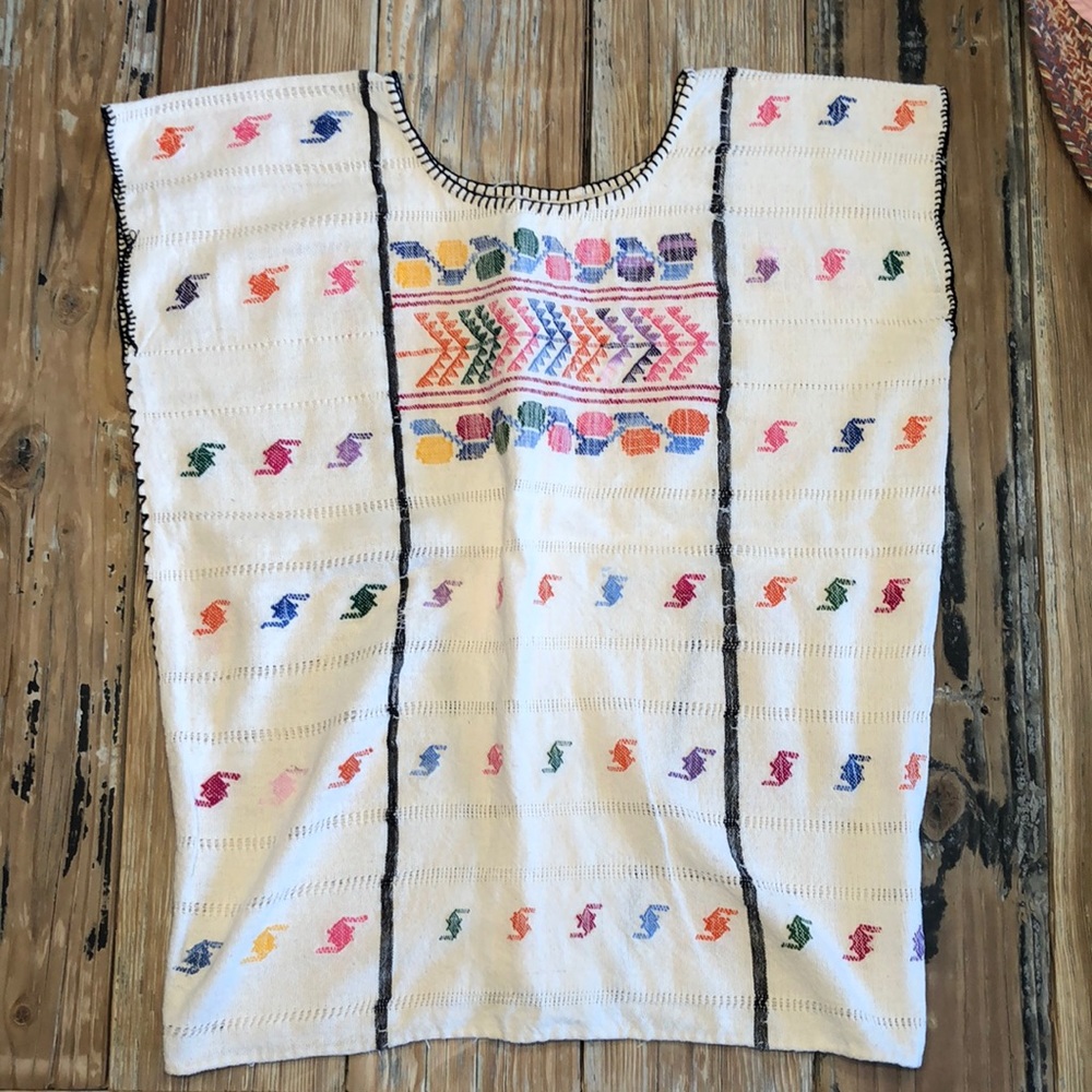 Embroidered blouse.